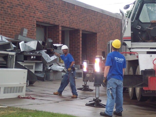 Two men in blue uniform - AC repairs in Trinidad, CO