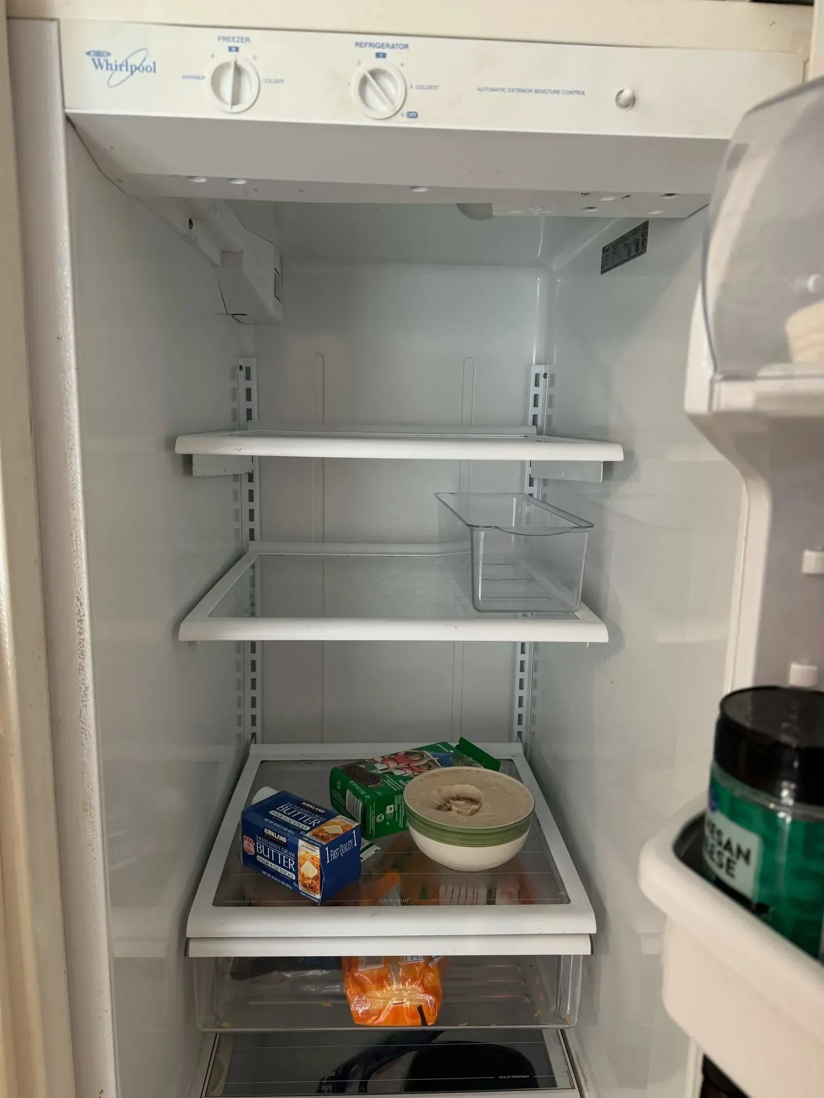 A garbage disposal unit installed under a kitchen sink.