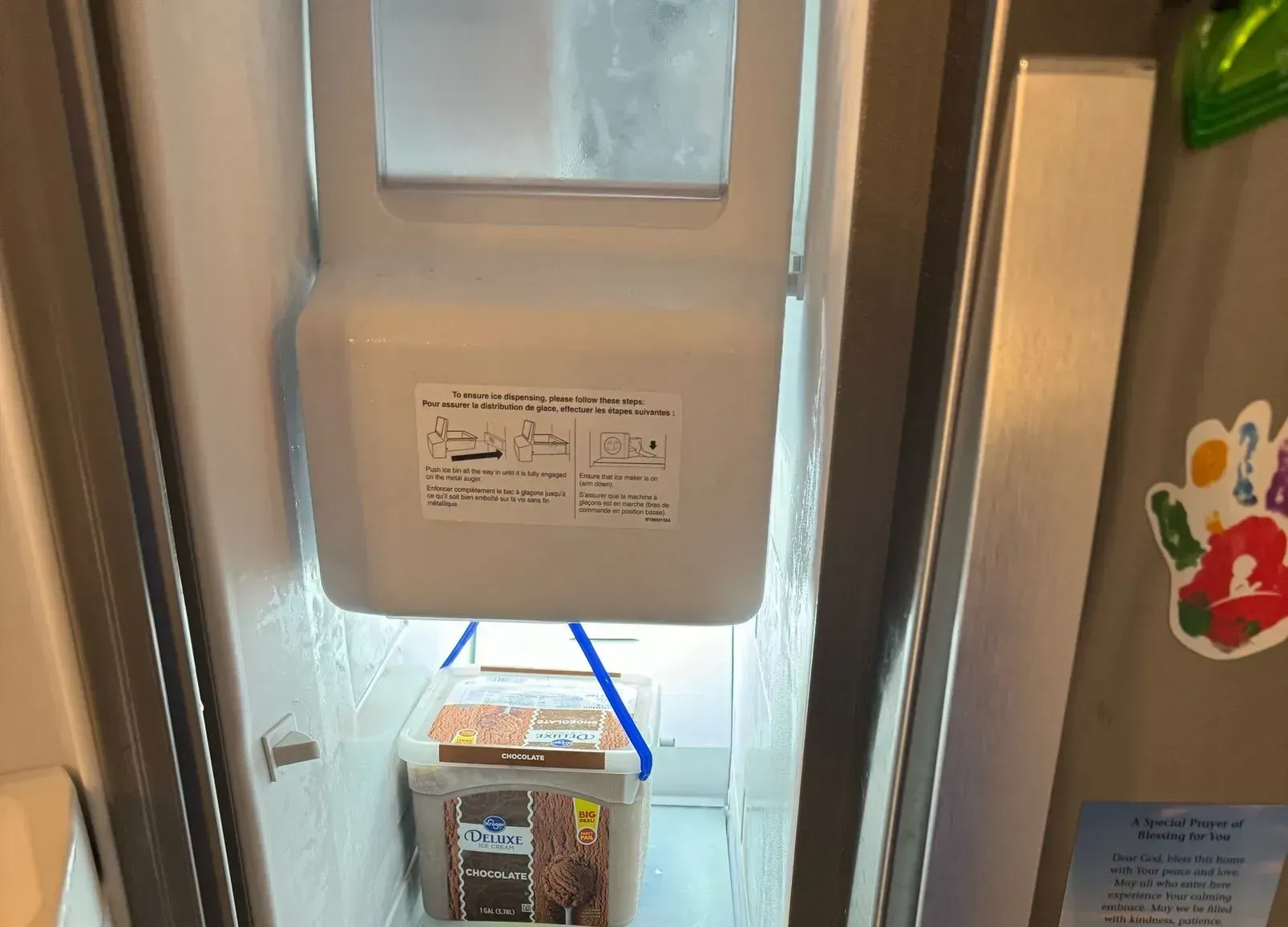 An ice maker sitting on a kitchen countertop, ready to produce ice cubes.
