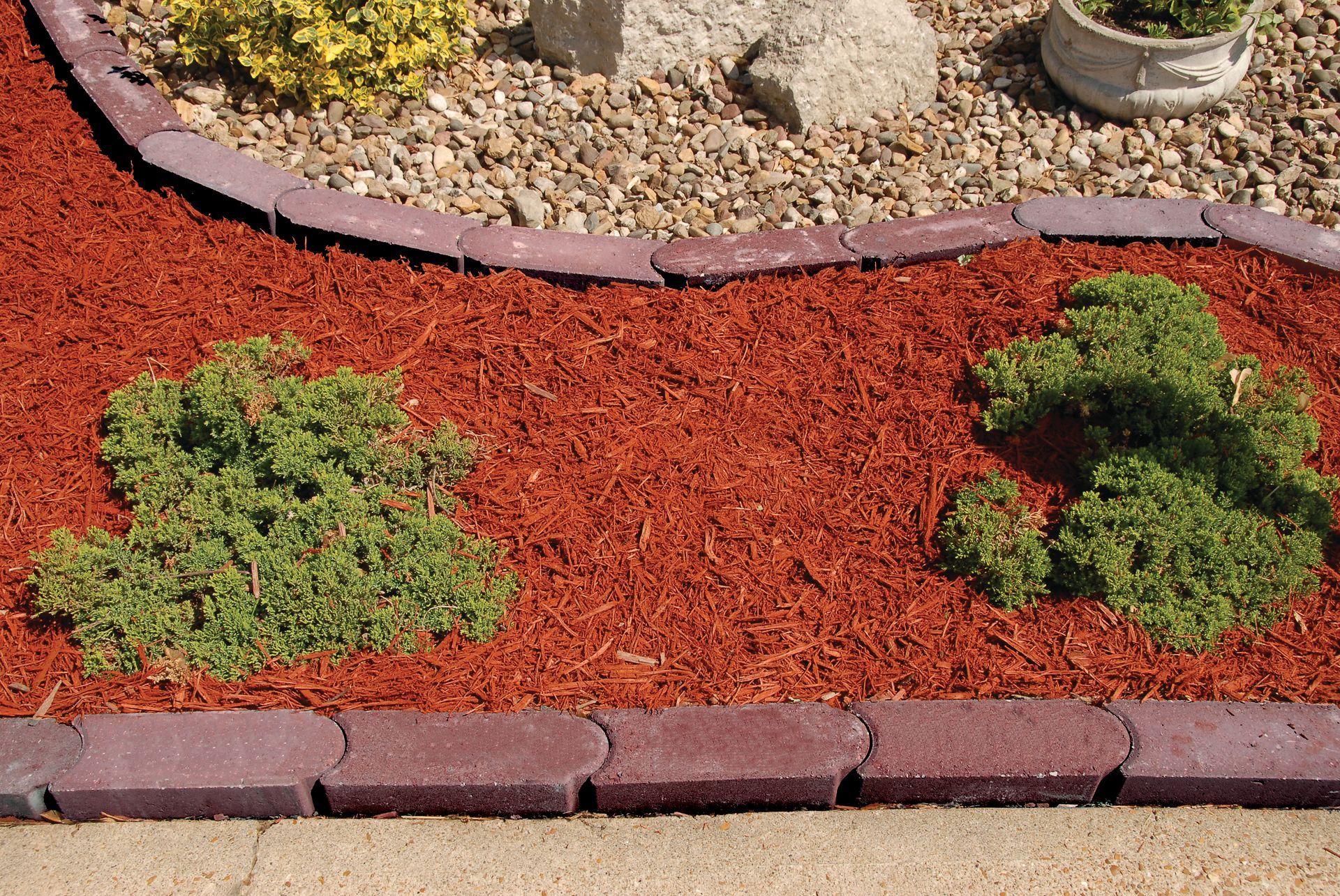 Add Decorative Rock & Mulch to Create a Beautiful Landscape Design With Stockman Stoneworks.
