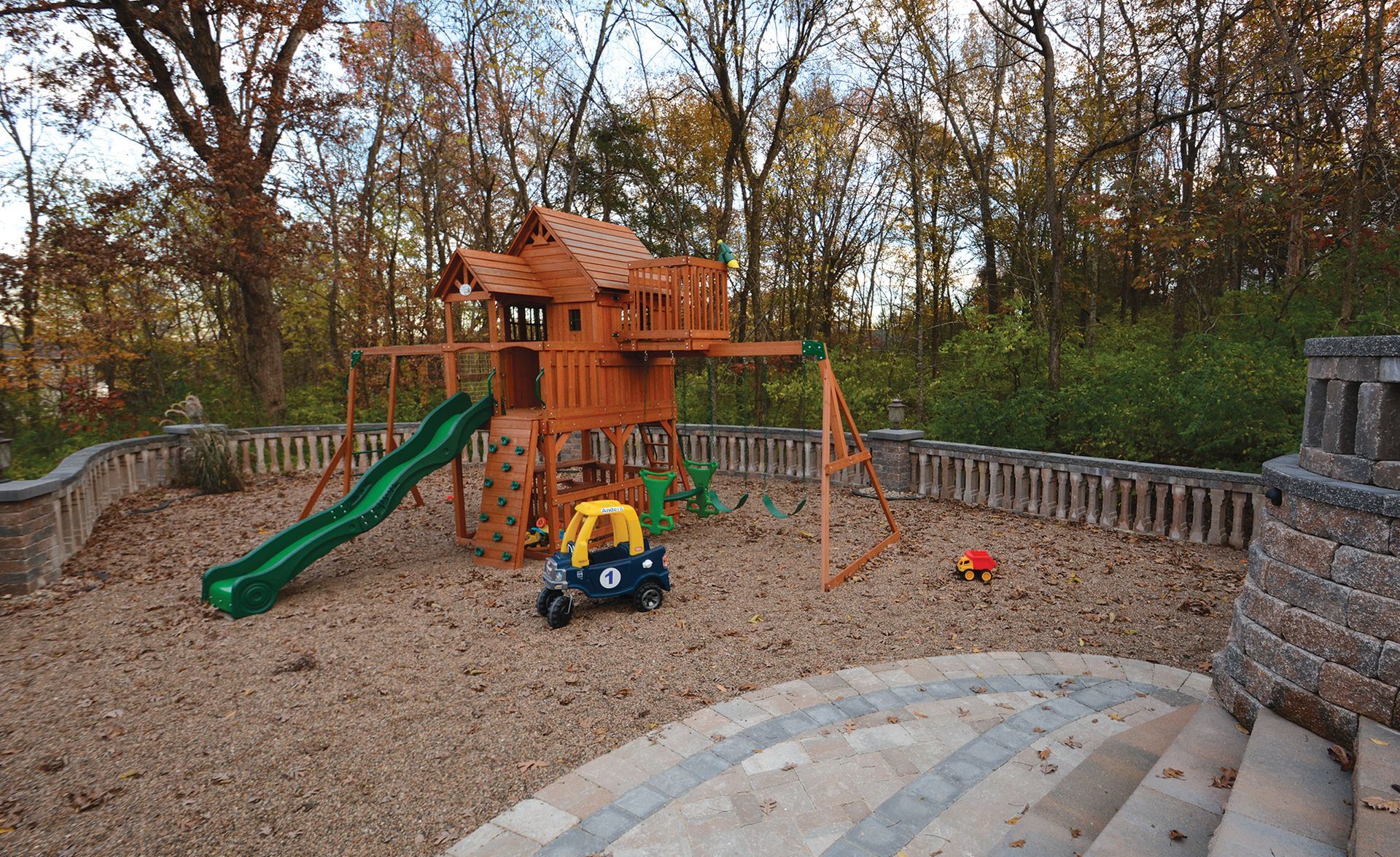 Include Slip-Resistant Pavers, a Kitchen Area, & a Pool for a Family Friendly Patio in Mid-Missouri.