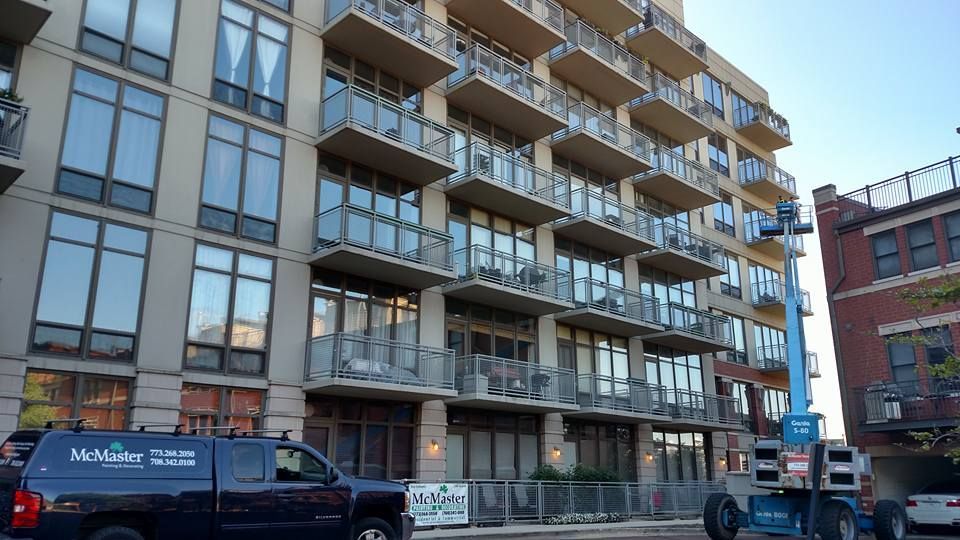 Black Van And A Tall Building — Chicago, IL — McMaster Painting