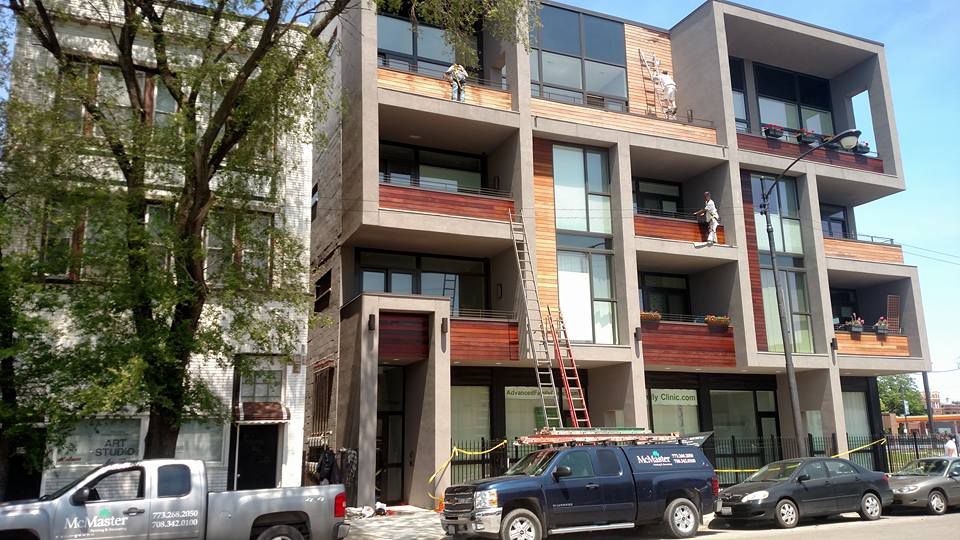 Building With a Lot of Windows and Cars Parked in Front of It — Chicago, IL — McMaster Painting