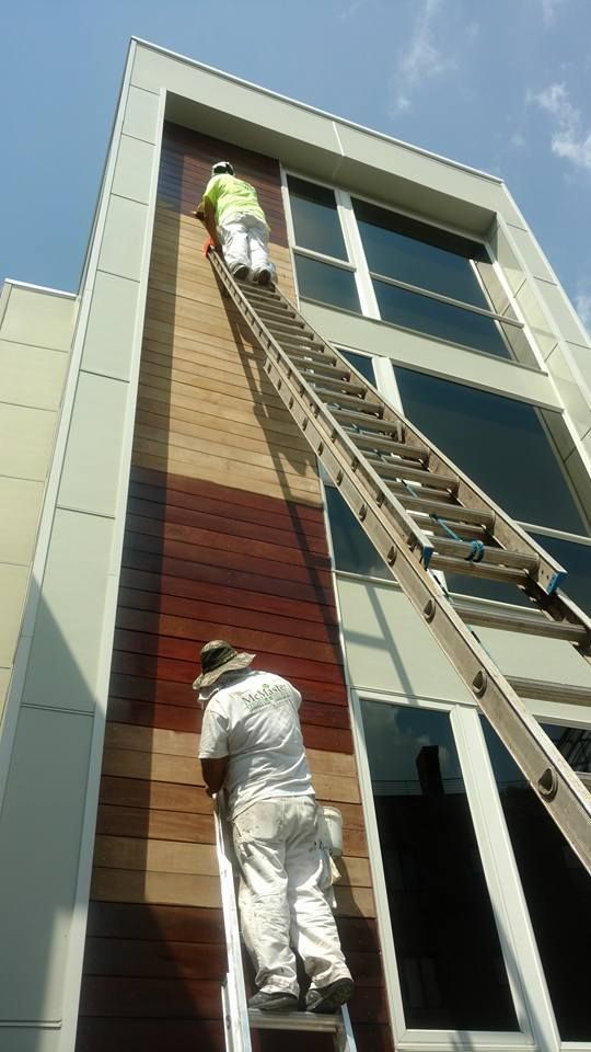 A Man Painting The Building — Chicago, IL — McMaster Painting