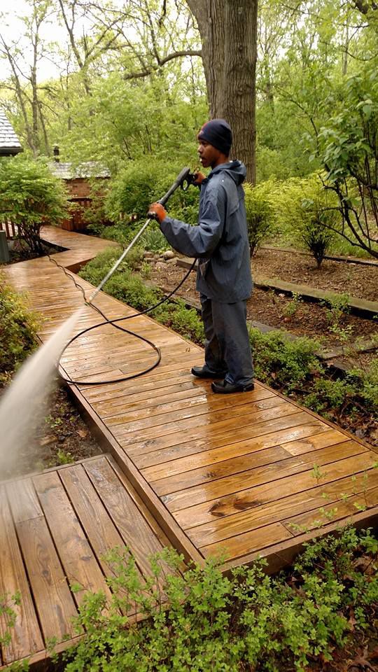 Using a High Pressure Washer to Clean a Wooden Walkway — Chicago, IL — McMaster Painting