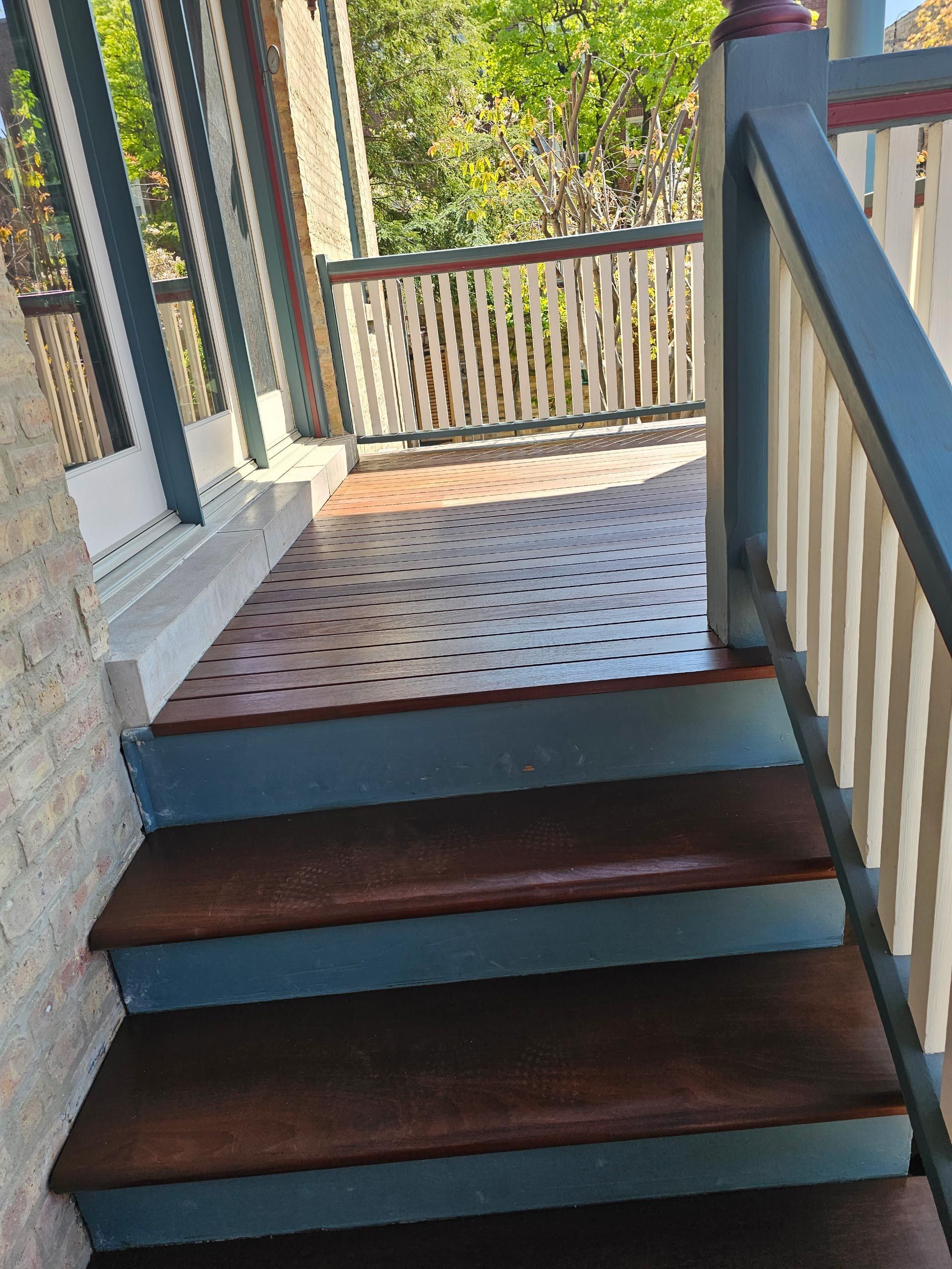Set of Stairs Leading Up to a Porch With a Railing — Chicago, IL — McMaster Painting