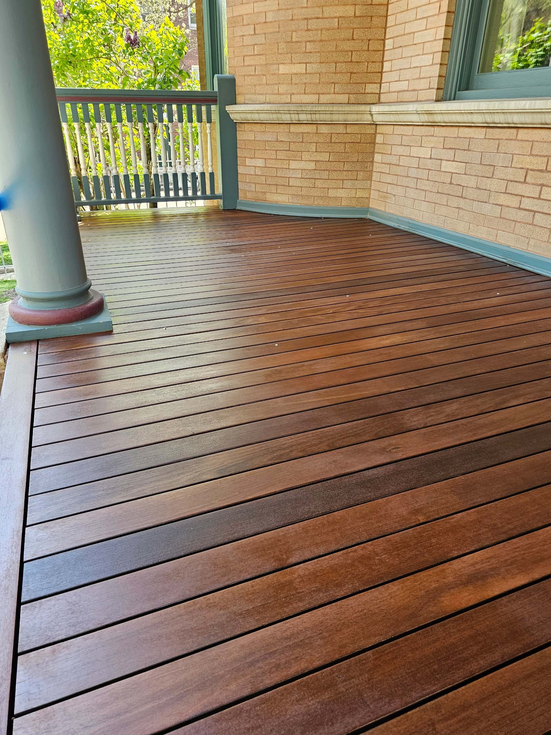 Wooden Deck With a Brick Building in the Background — Chicago, IL — McMaster Painting