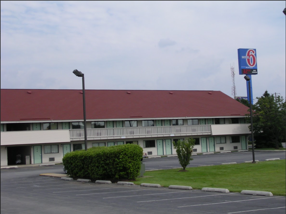 Exterior View of a Building with Red Roof - Chicago, IL - McMaster Painting