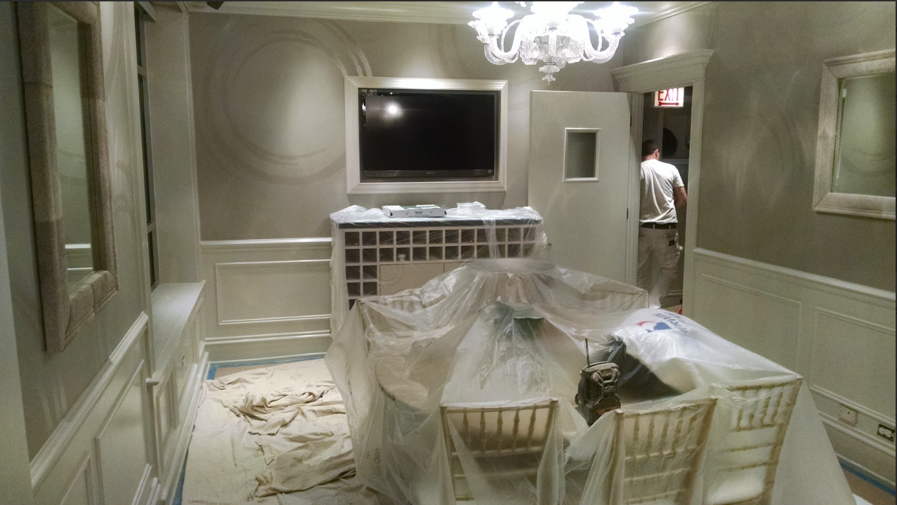 A Living Area With A Flat Screen TV On The Wall — Chicago, IL — McMaster Painting