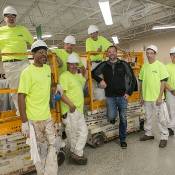 A Group of Workers Are Posing for A Picture — Chicago, IL — McMaster Painting