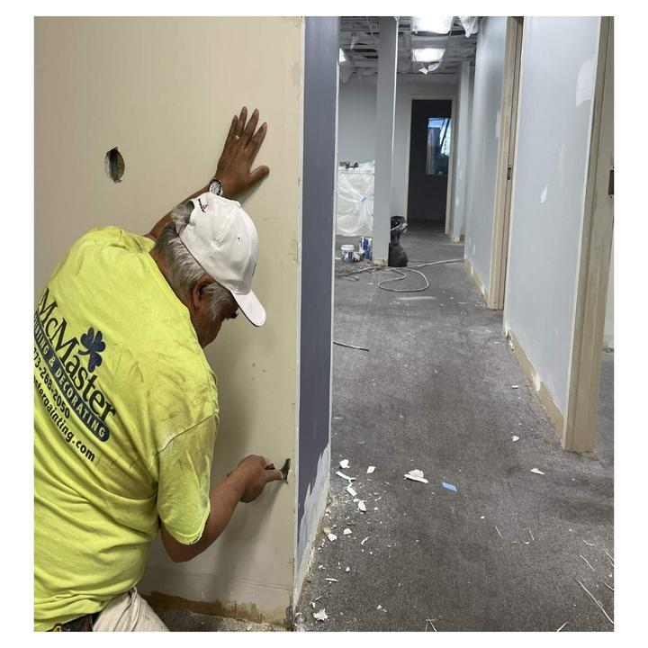 A Man Wearing a Yellow Shirt on Wall - Chicago, IL - McMaster Painting