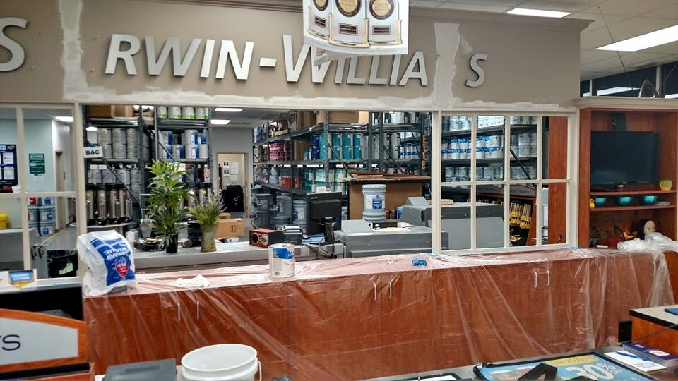 A Store Front with A Sign - Chicago, IL - McMaster Painting