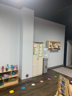 A Room with A Lot of Toys on The Floor and Shelves - Chicago, IL - McMaster Painting