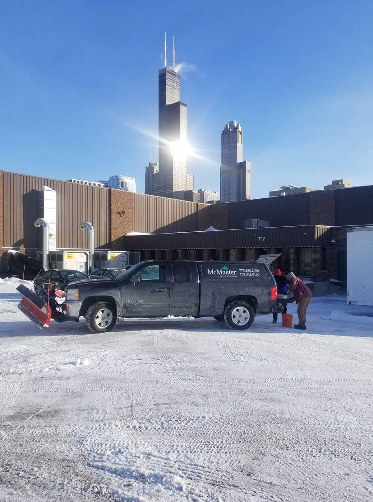 A Truck Parked in A Snowy Parking Lot — Chicago, IL — McMaster Painting