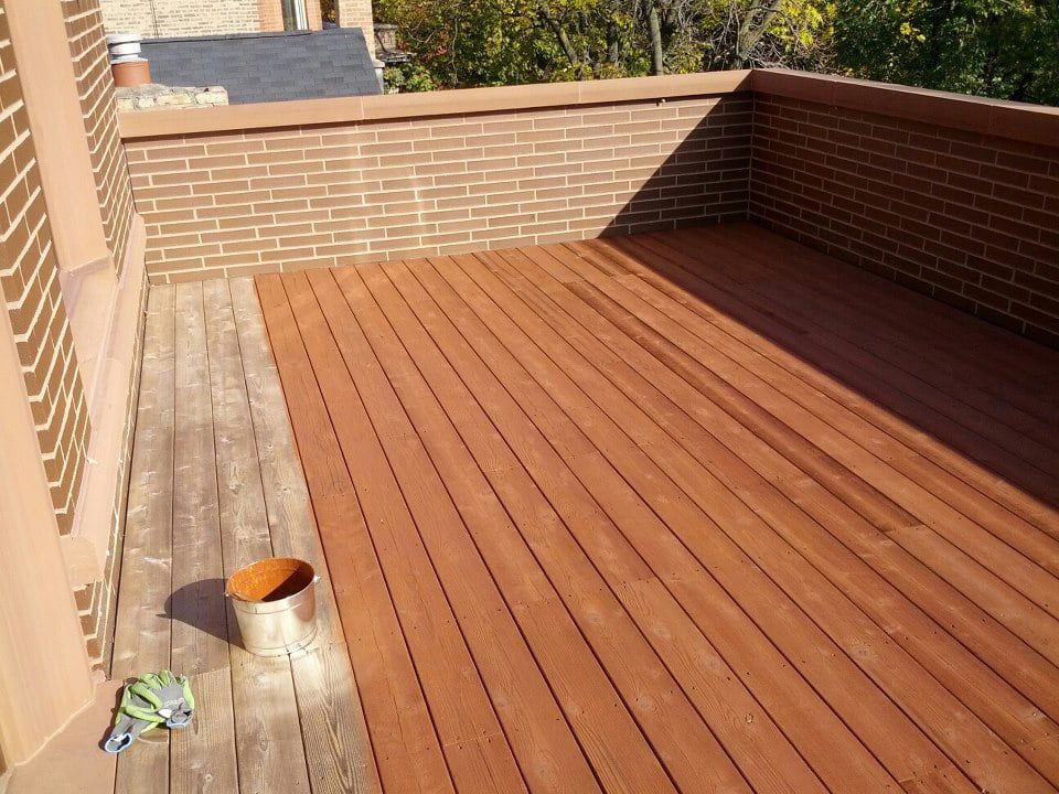 Wooden Deck With a Bucket of Paint on It — Chicago, IL — McMaster Painting