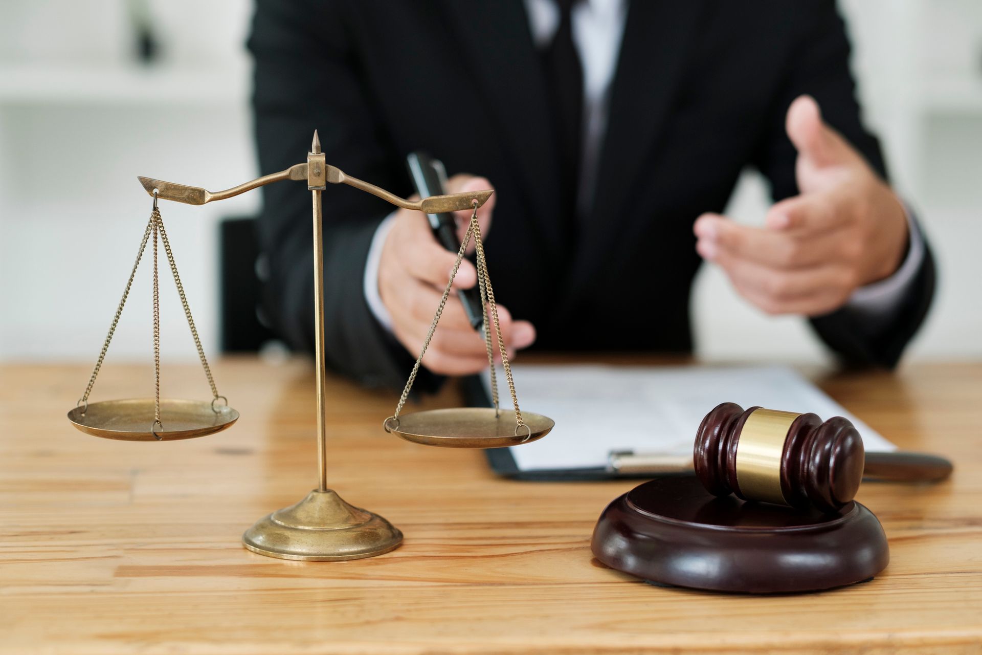 Attorney consulting with client about military-related legal offense and possible defenses.