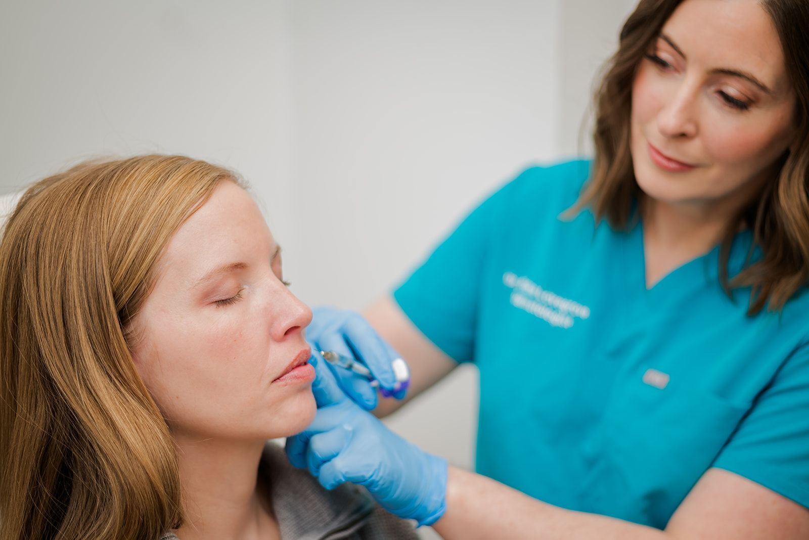 Dr. Fiona Lovegrove injecting lip filler, lip filler treatment