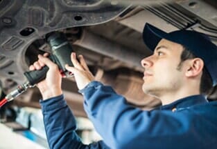 Mechanic Repairing Engine — Auto Repair Services in Duluth, MN