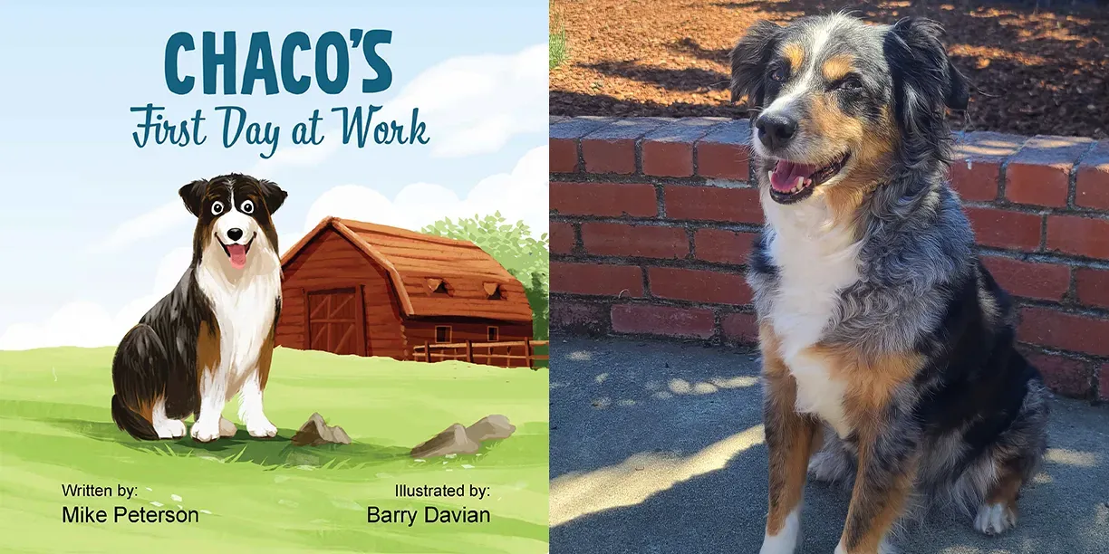 Chaco next to his book