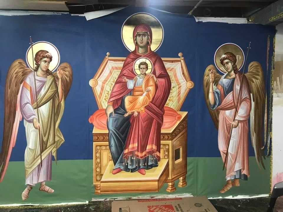 A painting of a woman sitting on a throne with two angels