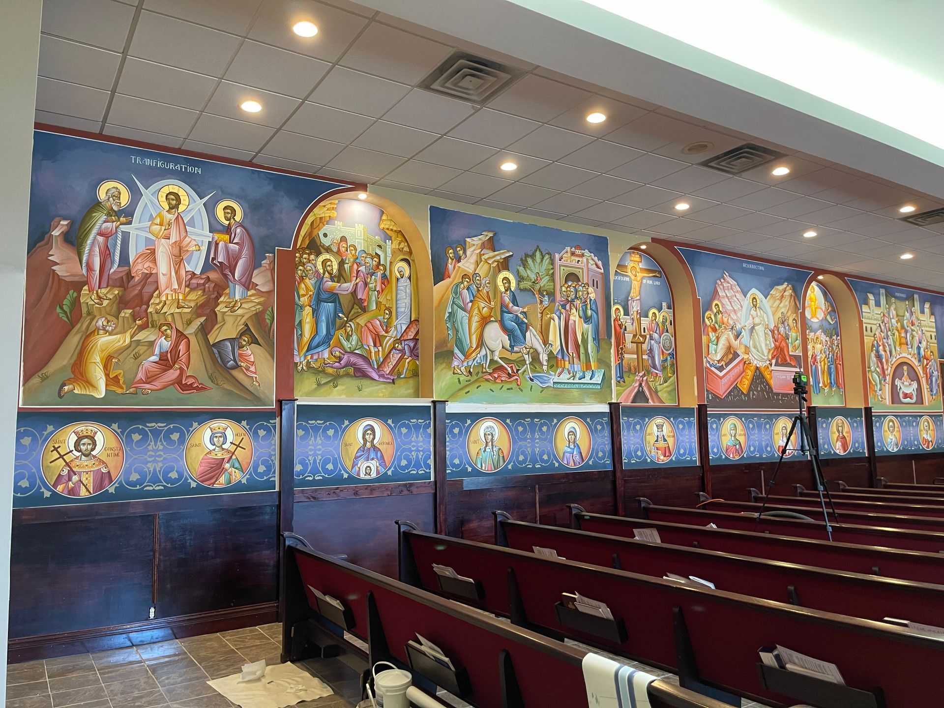 A church with a lot of paintings on the wall