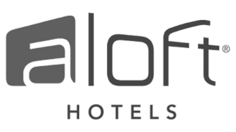 The grey Aloft Hotels logo, featuring a stylized lowercase "aloft" with "HOTELS" written in capitalized, sans-serif font.