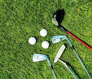Custom Clubs — Golf Clubs and Balls on Grass in Bethlehem, PA