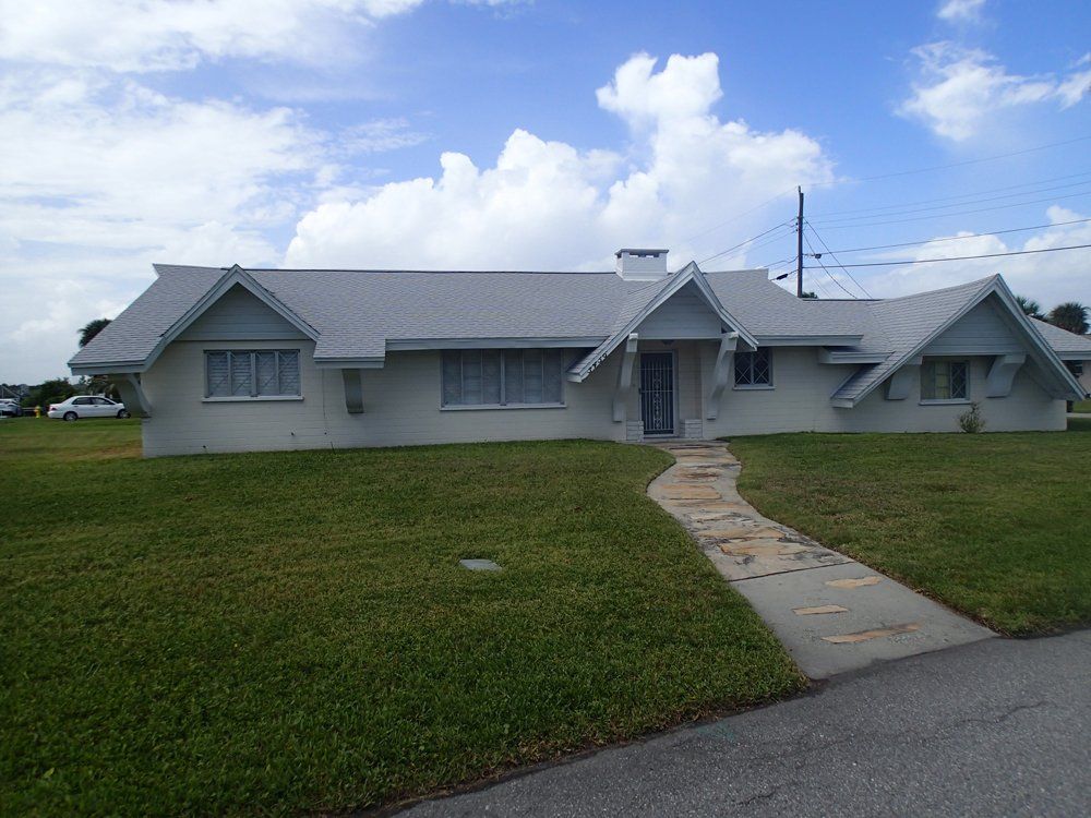 Pale Blue House — South Daytona Beach, FL — Dal Mar Roofing Industries Inc