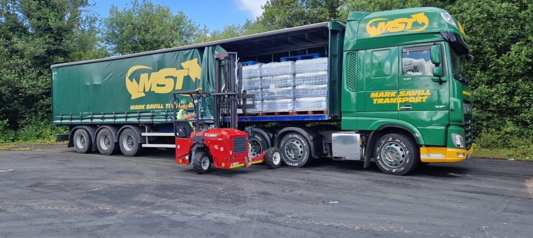 Moffett unloading MST lorry