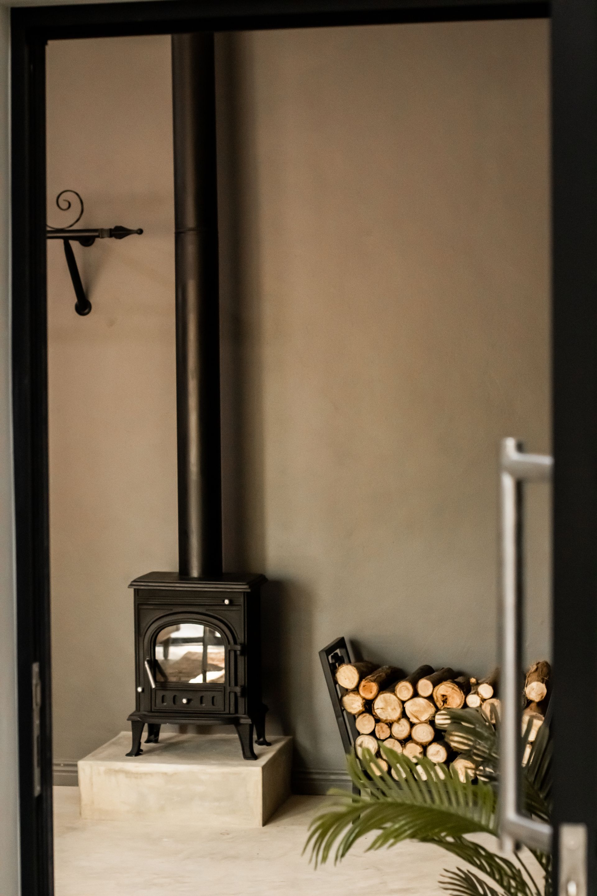 A wood stove in the Honeymoon Suite at Riverside Castle, a premier wedding venue in Pretoria.