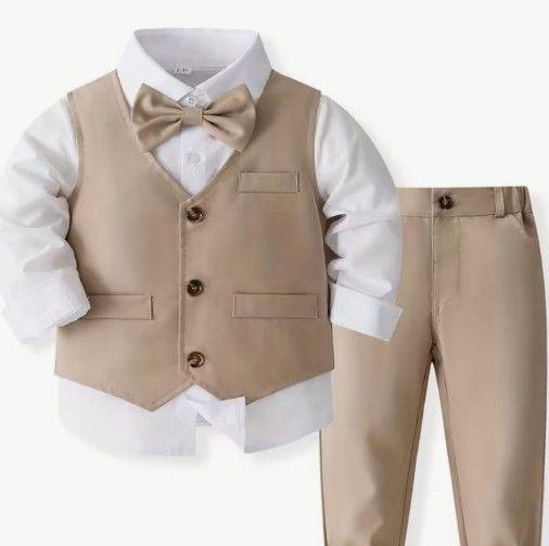 Tan vest and pants with white collared shirt and bow tie.