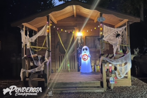 A ponderosa campground is decorated for halloween