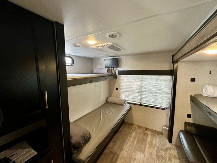 There is a bunk bed in the back of the trailer.