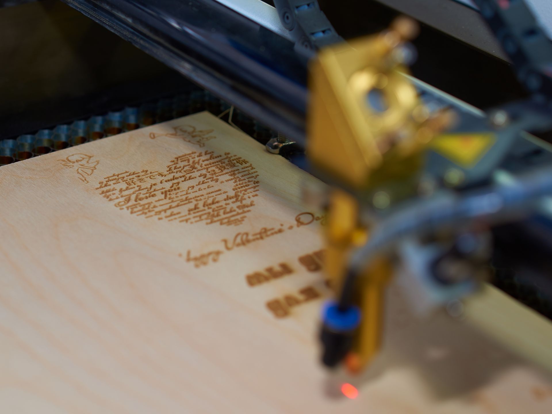 Laser engraving in wood board.