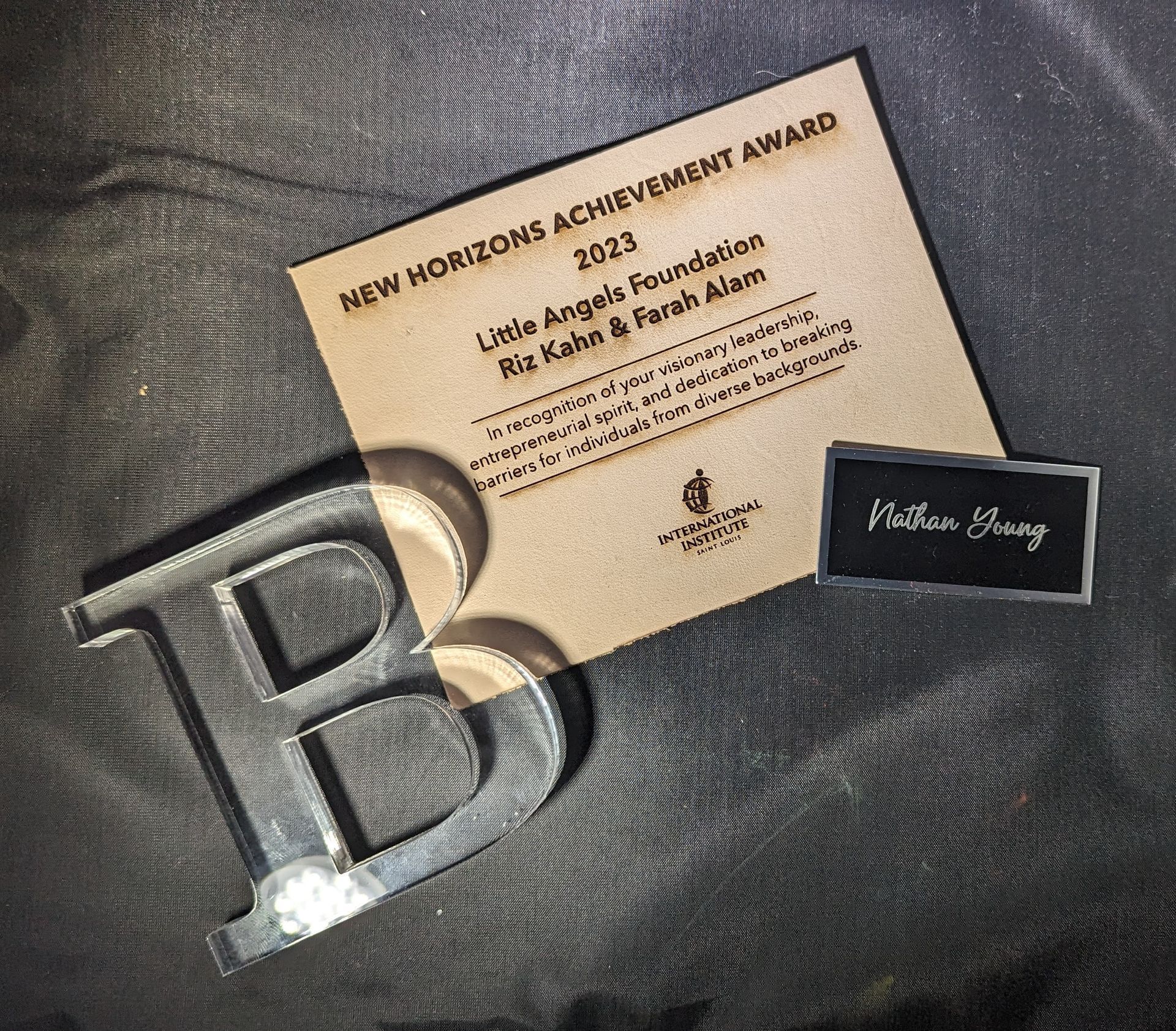 A plaque for the new horizons achievement award.