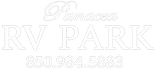 White logo for RV Park with stylized script and phone number 850-984-5888