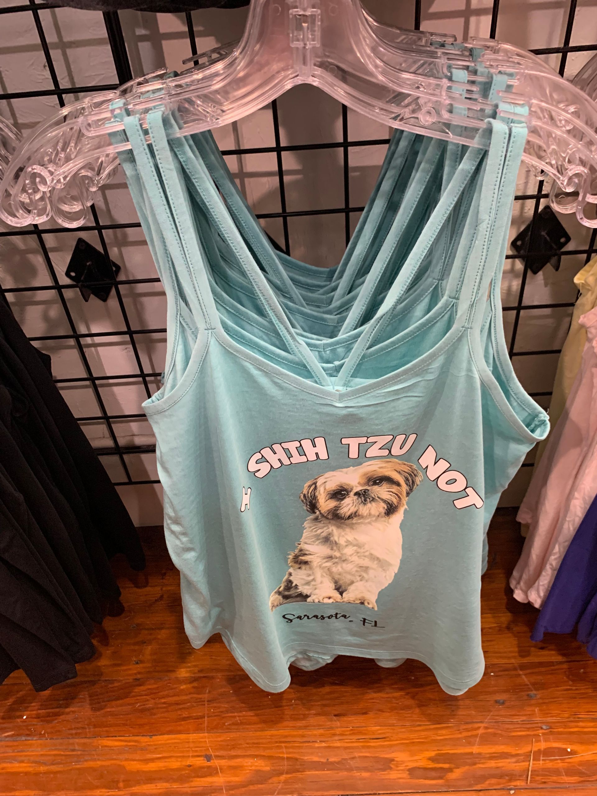 Light blue Shih Tzu tank top with dog graphic and text 