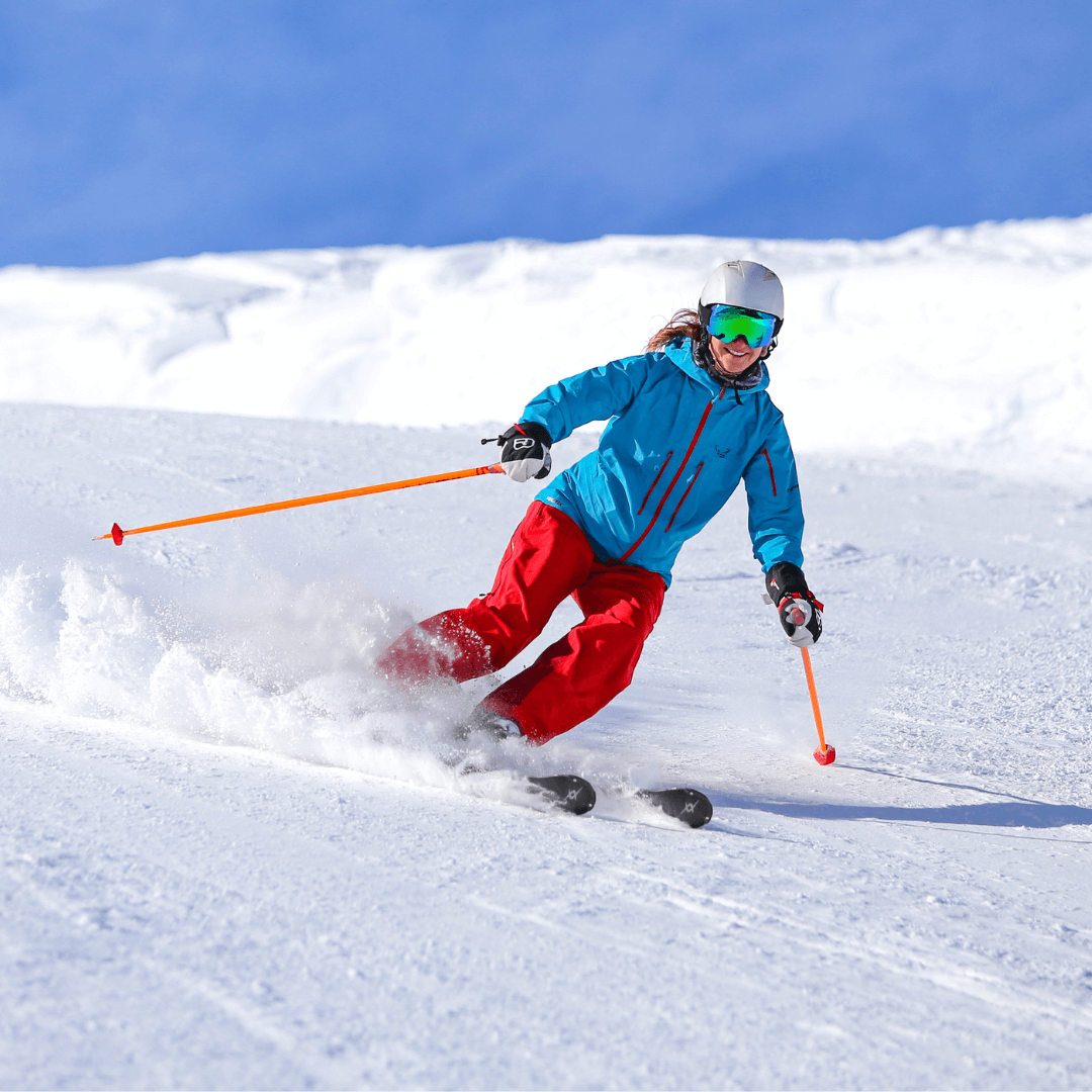 woman skiing downhill