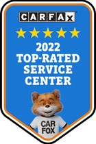 A carfax top-rated service center badge with a fox wearing a car fox shirt.