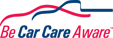 A logo for be car care aware with a red and blue ribbon