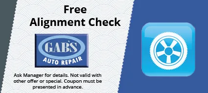 Coupon for a free alignment check at Gab's Auto Repair. Features a tire icon.