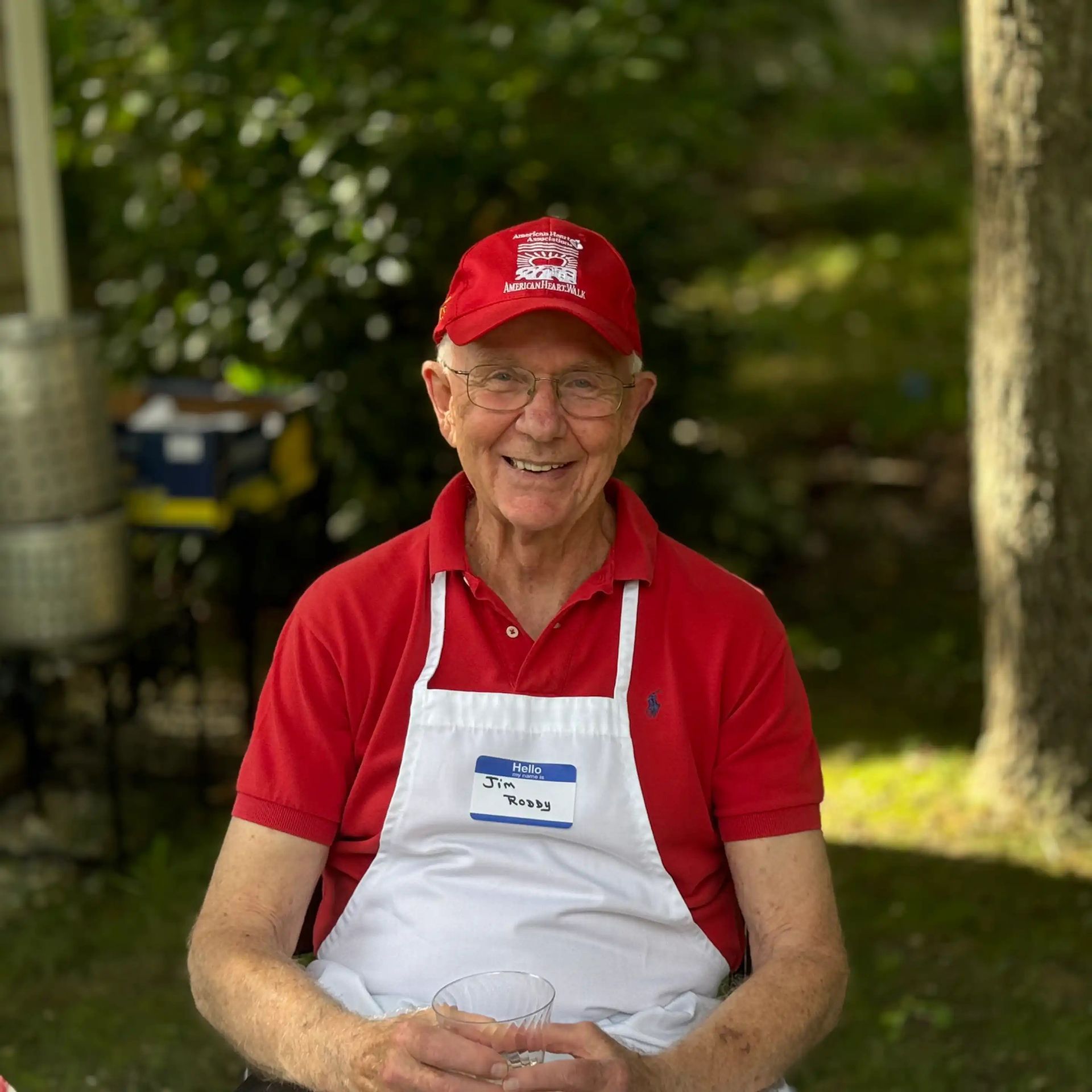 wearing a red shirt and an apron1
