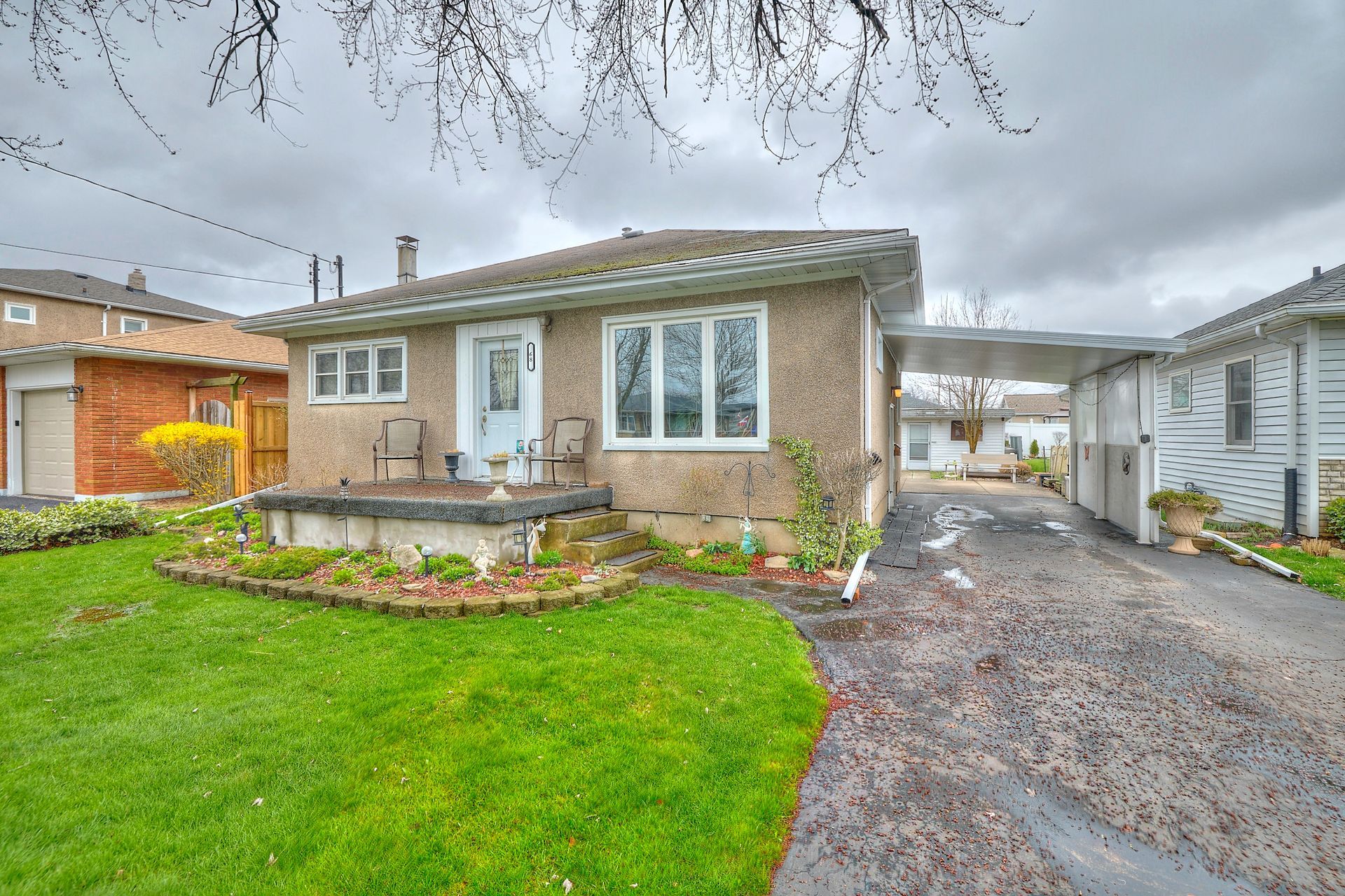 A well-maintained original-owner bungalow with a carport featuring three bedrooms.