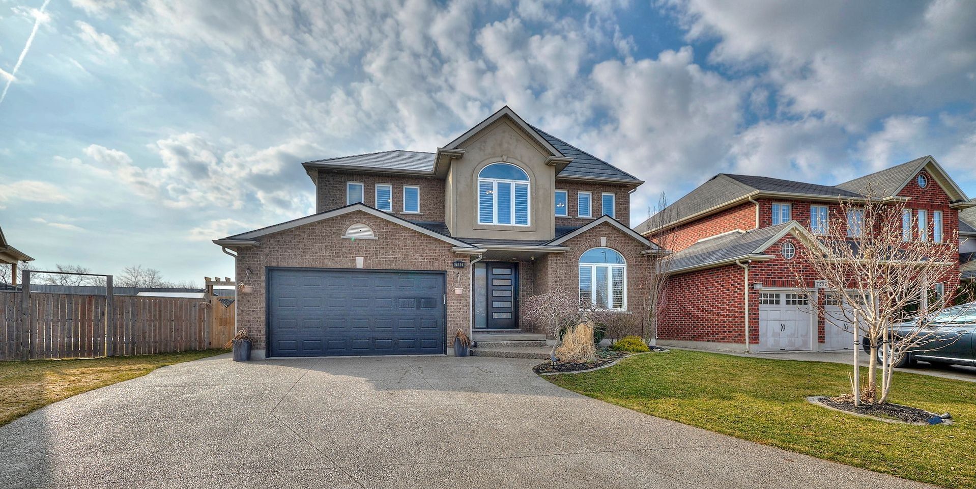 An enchanting snapshot of a large detached serene residential house.