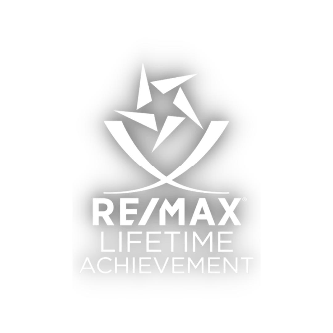 The prestigious RE/MAX Lifetime Achievement logo, an exceptional accolade awarded to Kim Robinson, featuring a trophy star symbol. This esteemed recognition celebrates outstanding accomplishments, signifying over $3 million in gross commissions and a minimum of 7 years of active service with RE/MAX. A testament to Kim's unparalleled success and dedication in the real estate industry.