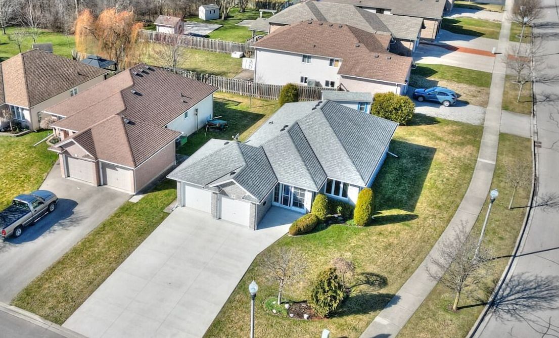 A birds-eye view of a white and grey bungalow detached home located in Welland, Ontario.