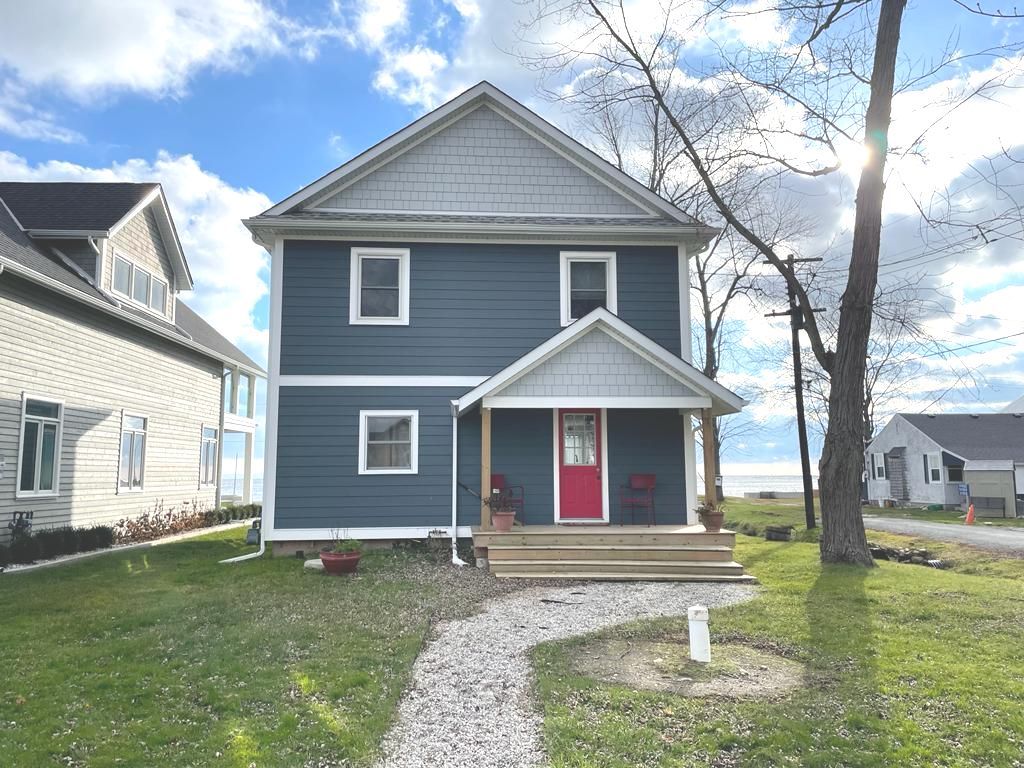 Residential haven with picturesque trees and a breathtaking blue sky.
