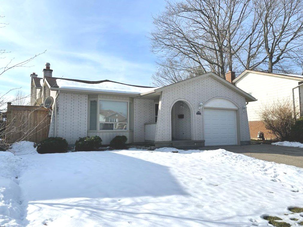 Enchanting house with a blue sky and white snow all around.