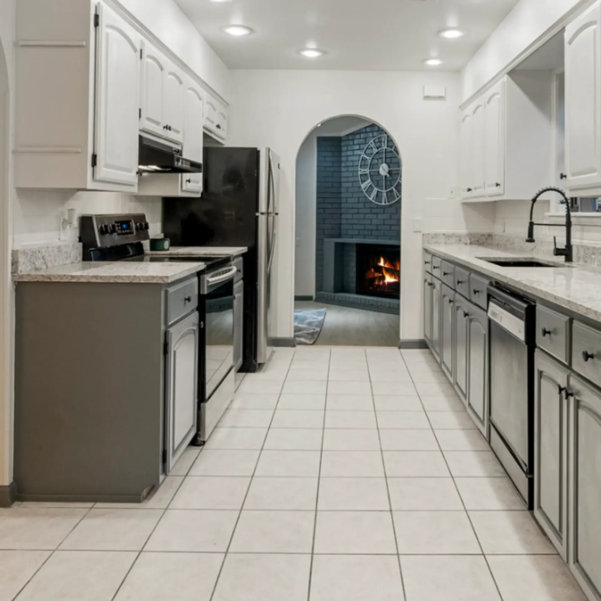 Aarons Repair and Remodel - A kitchen with white cabinets and a black refrigerator