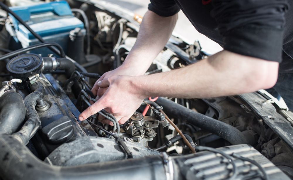 A Man is Working on the Engine of a Car — East Coast Mechanic in Nambucca Heads, NSW